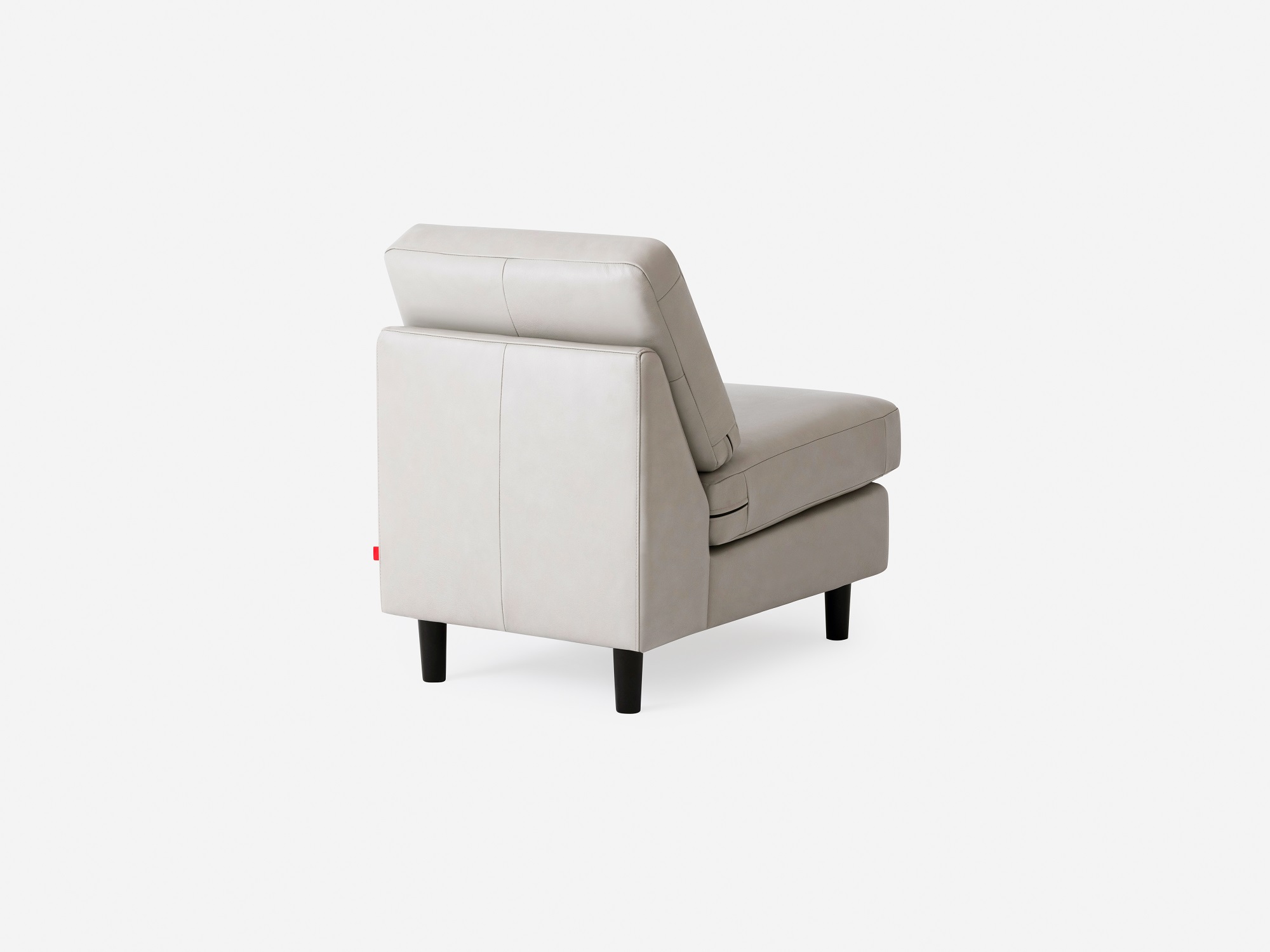 Back view of the Solo mid century armless chair in white leather